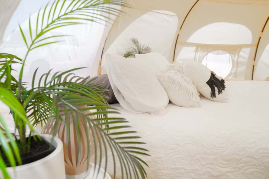 Glamping Pillows and Comforter on a Bed