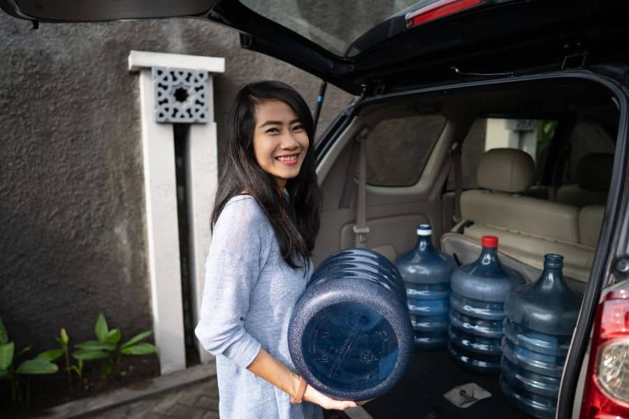 Taking Water Jugs in Back of SUV