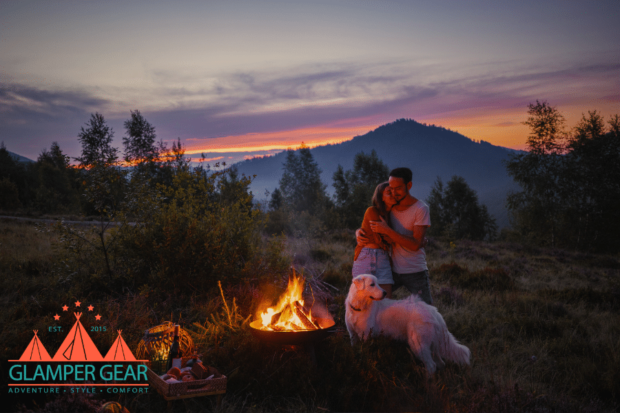 Couple Cuddling Next to Campfire